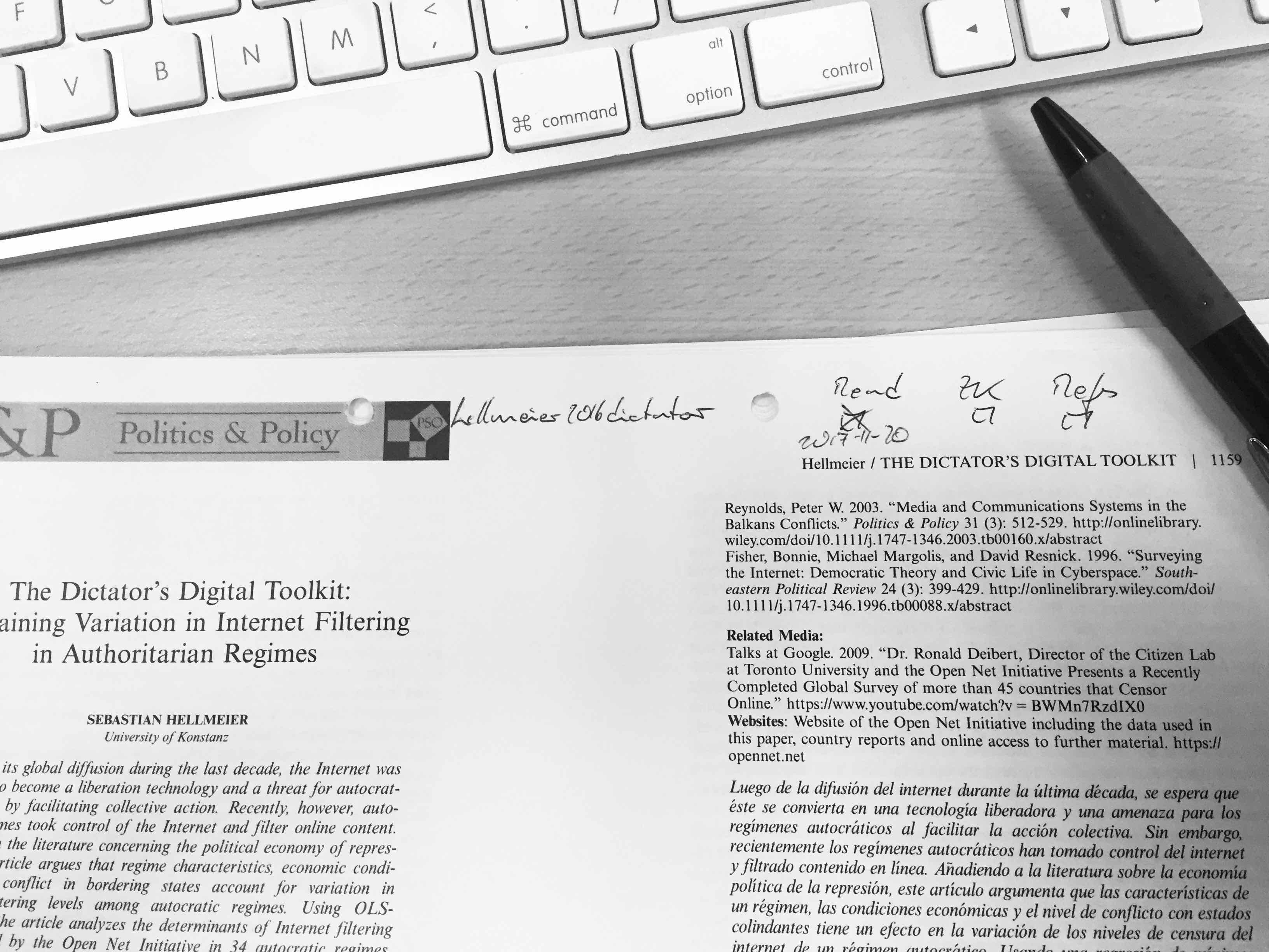 Photo of a printed paper with handwritten citekey and checkboxes